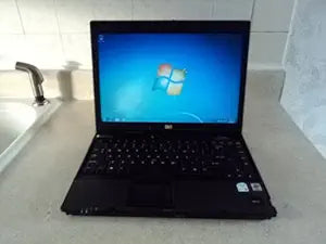 HP NC6400 Core 2 Duo Windows 7 Laptop — main product image