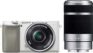 Sony A6100 Mirrorless Camera: 16-50mm & 55-210mm Lenses (White) — main product image