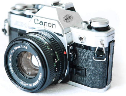 Canon AE-1 Vintage 35mm SLR Camera with 50mm Lens - Renewed