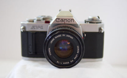 Canon AV-1 35mm SLR Film Camera: FD Mount Lens (Renewed)
