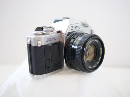 Canon AV-1 35mm SLR Film Camera: FD Mount Lens (Renewed)