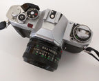 Canon C12-1801-211 AV-1 35mm SLR Camera FD 50mm Lens